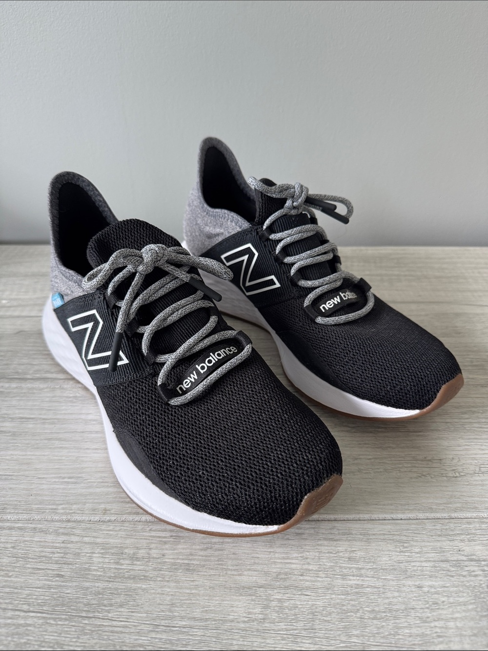 New Balance Woman’s Black and Gray Knit Sneakers